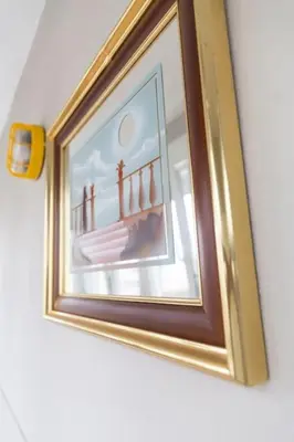 a picture of a picture of a pier on a wall at Al lado de la victoria in Cádiz