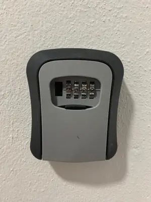 a black and white object on a wall at Apartamento El Arrumbador in Jerez de la Frontera