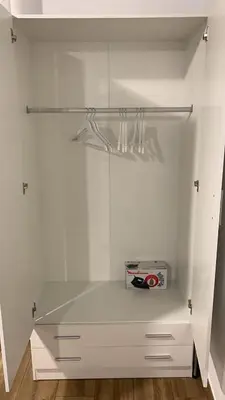 a white closet with a box on a shelf at Apartamento El Arrumbador in Jerez de la Frontera