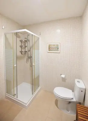 a bathroom with a shower and a toilet at Atico Brisa in Cádiz