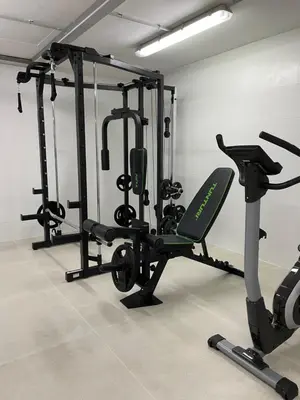 a gym with several tread machines in a room at Apartamentos Playa Victoria - by Grupo Tribu in Cádiz