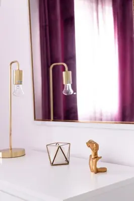 a bathroom sink with two lights and a mirror at Libertad by Gades Gestión in Cádiz