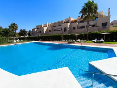 a large swimming pool in front of a building at Costa Ballena Mar Abierto in Costa Ballena