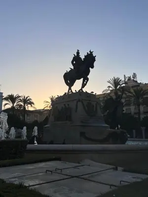 a statue of a man riding a horse in a fountain at Apartamentos La Albariza Jerez Centro in Jerez de la Frontera