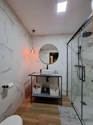 a bathroom with a sink and a mirror at Centro de Sanlúcar, La Plata 23 in Sanlúcar de Barrameda