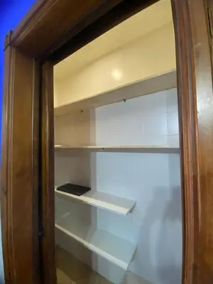 a glass door of an empty refrigerator at Chalet La Garrocha in Chiclana de la Frontera