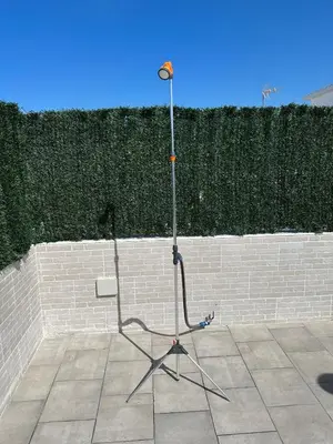a stand up microphone in front of a brick wall at Chipiona Suites B in Chipiona
