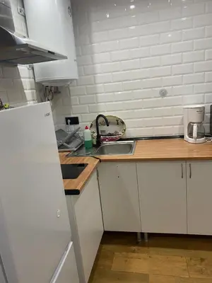 a kitchen with a sink and a counter top at MiaEle in Sanlúcar de Barrameda