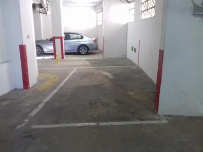 a parking lot with a car parked in it at 1ª Línea de playa, ESPECTACULARES VISTAS, GARAJE, WIFI in Rota