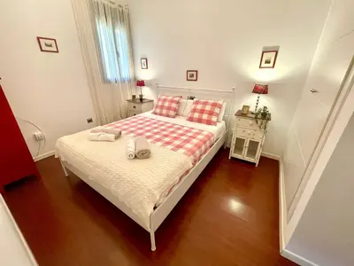 a bedroom with a bed with two towels on it at GATU PREMIUM La Brisa 