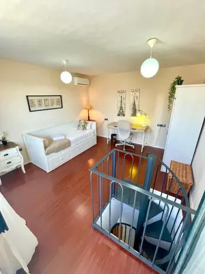 a living room with a couch and a table at GATU PREMIUM La Brisa 