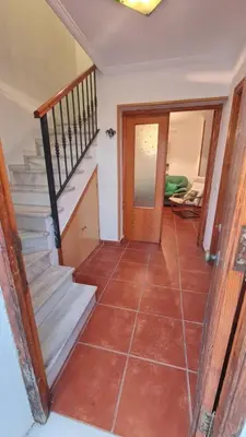 a staircase in a house with a tiled floor at Vaca House in El Puerto de Santa María
