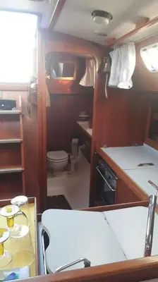 a small kitchen with a toilet and a sink at Boat-Apartamento flotante Cádiz.. La Juanita Arroyo in Cádiz