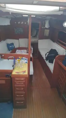 a room with two beds and a desk in a boat at Boat-Apartamento flotante Cádiz.. La Juanita Arroyo in Cádiz