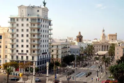 a view of a city with buildings and a street at Apartamento Fenix - Recién renovado y vistas al mar in Cádiz