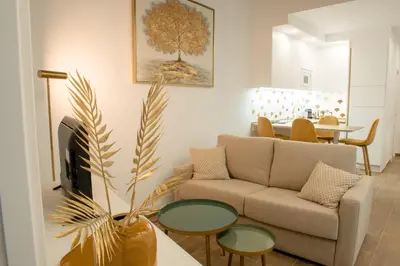 a living room with a couch and a table at Torre Solana 41 in Cádiz