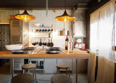 a kitchen with a counter with some glasses of wine at Gatu Selecta 5 Diseño calidad wifi, aire acc junto recinto ferial, Preferente mayores de 21 años y familias in Jerez de la Frontera
