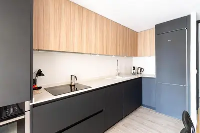 a white walk in closet with white cabinets at Apartamento La Salina in San Fernando