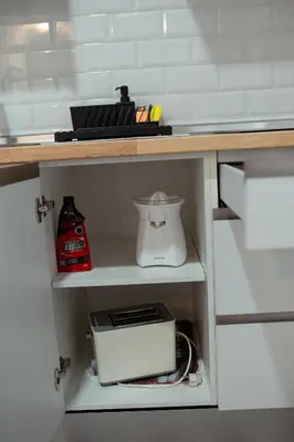 a kitchen cabinet with a counter top with a blender at APARTAMENTO EL EMBRUJO in Jerez de la Frontera