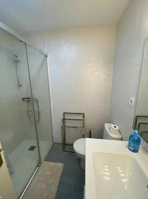 a bathroom with a shower and a toilet and a sink at Cozy Apart. Costa Sancti Petri by Chiclana Dreams in Novo Sancti Petri