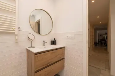 a bathroom with a sink and a mirror at Vegaluz in Jerez de la Frontera