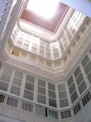 a ceiling of a building with lots of windows at Las 4 Torres by Gades Gestión in Cádiz