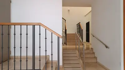 a staircase leading to the second floor of a house at Sherryflat Aina Parking in Jerez de la Frontera