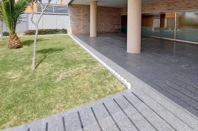 a room with a window and a tile floor at Piso a dos calles de la playa in El Puerto de Santa María