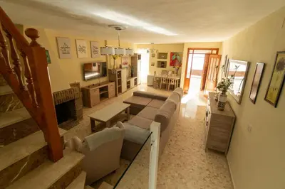 a living room with a couch and a table at Casa rural El Tejar de Algar / 1262 in Algar