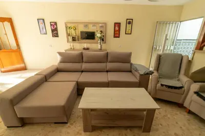 a living room with a couch and a table at Casa rural El Tejar de Algar / 1262 in Algar