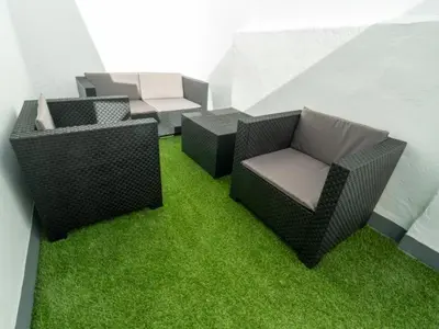 a room with chairs and tables and green grass at Casa rural El Tejar de Algar / 1262 in Algar