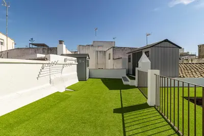 a view of a balcony with green grass at Allo Apartments Arroyo Catedral in Jerez de la Frontera