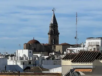 a view of a city with a church tower at La Terraza de Porvenir 10 - Jerez de la Frontera in Jerez de la Frontera