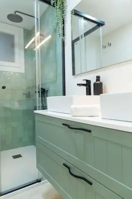 a bathroom with a sink and a shower at Zurbarán by Gades Gestión in Cádiz