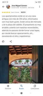a screenshot of a website with a picture of a garden at La gota de leche 4 in Sanlúcar de Barrameda