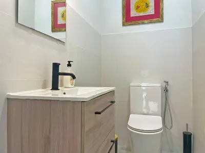 a bathroom with a sink and a toilet at Apartamento Villamarta - Ole Solutions in Jerez de la Frontera