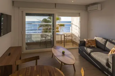 a living room with a couch and a table at DELFIN Sunny Home by Cadiz4Rentals in Cádiz