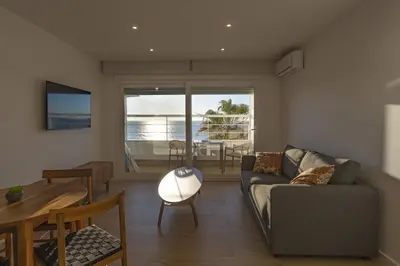 a living room with a couch and a table at DELFIN Sunny Home by Cadiz4Rentals in Cádiz