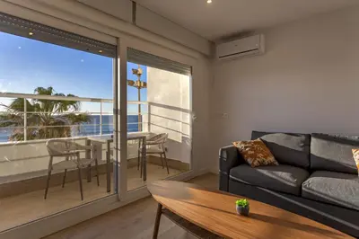 a living room with a couch and a table at DELFIN Sunny Home by Cadiz4Rentals in Cádiz
