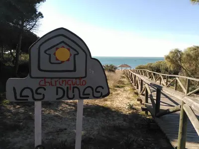 a sign for a la ducas sign on a beach at Piscina y garaje a 300 m de playa OJO VER CORREO NO DESEADO SI NO LLEGA RESPUESTA in Rota