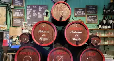 a display of wine barrels in a wine store at APARTAMENTO BRIANNA in Jerez de la Frontera