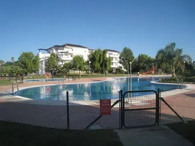 a large pool of water in a park at Vacaciones de lujo GOLF-PLAYA. Costa Ballena-Cádiz in Rota