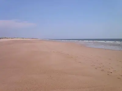 an empty beach with footprints in the sand at Vacaciones de lujo GOLF-PLAYA. Costa Ballena-Cádiz in Rota