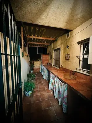 a hallway of a building with a sink in it at Bonito y ubicación inmejorable in Sanlúcar de Barrameda
