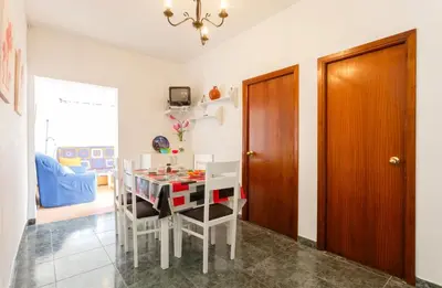 a dining room with a table and chairs at Apartamento Casa Postas II in Conil de la Frontera