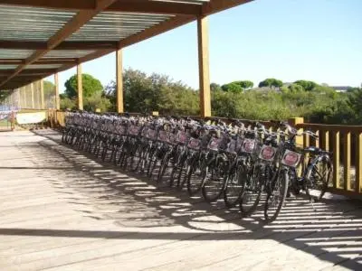 a row of bikes parked on a bridge at Apartamento Las Olas de Valdelagrana in El Puerto de Santa María