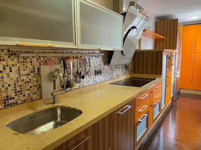 a kitchen with a sink and a counter top at APARTAMENTO SALINAS VALDELAGRANA - WiFi, Playa, Piscina in El Puerto de Santa María