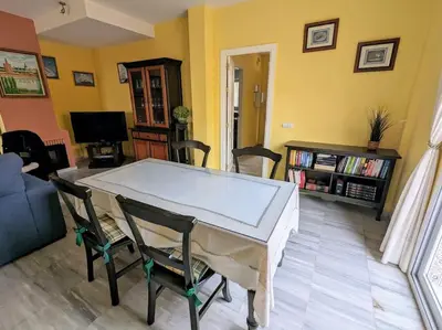 a living room with a ping pong table at Adosada en El Puerto Santa María in El Puerto de Santa María