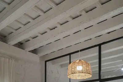 a chandelier hanging from a ceiling in a room at Estudio Palacios Norte in El Puerto de Santa María