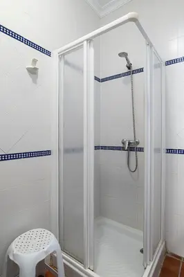 a shower with a glass door in a bathroom at Bellavista De Conil in Conil de la Frontera